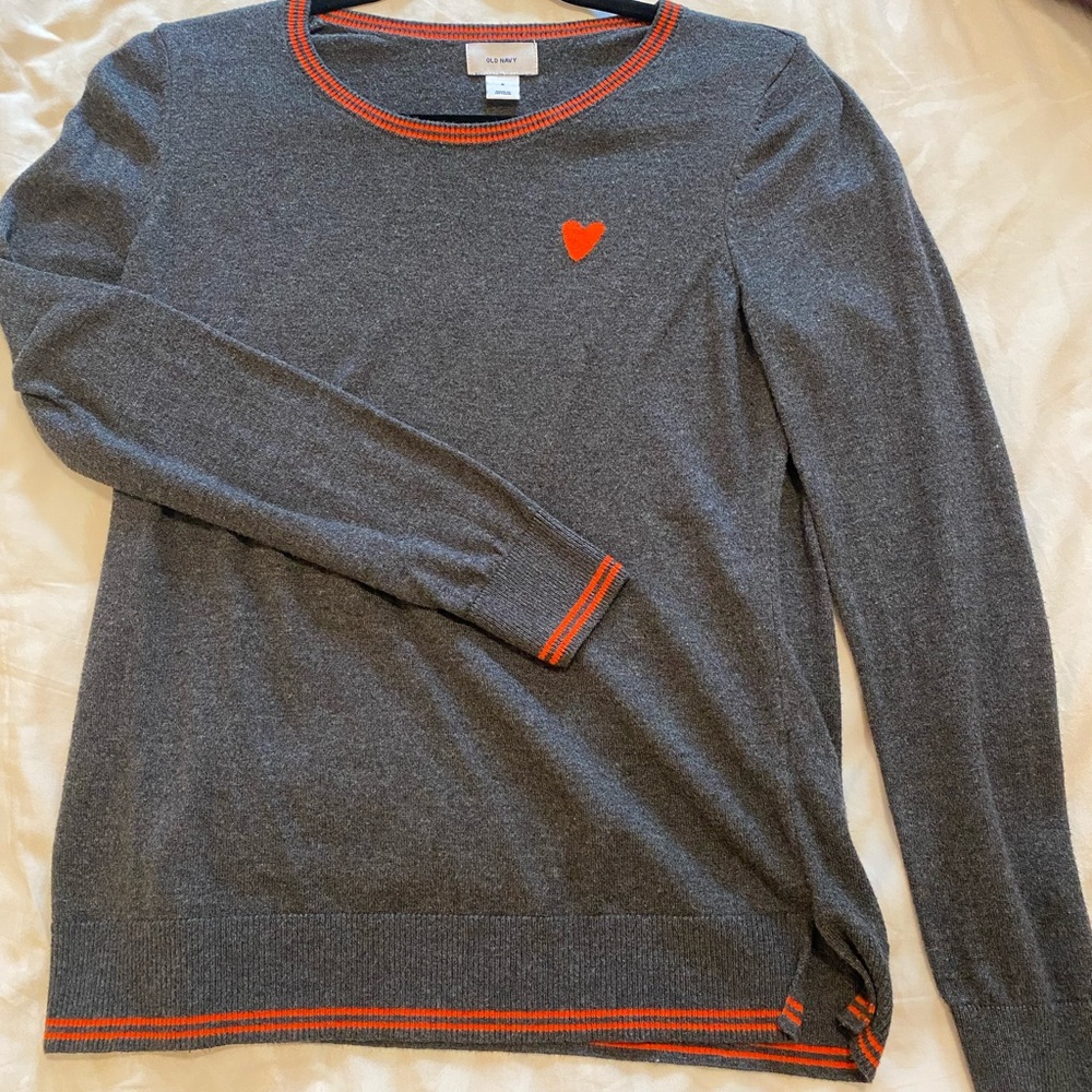 Light knit long sleeved top. Perfect transitional piece for the season
